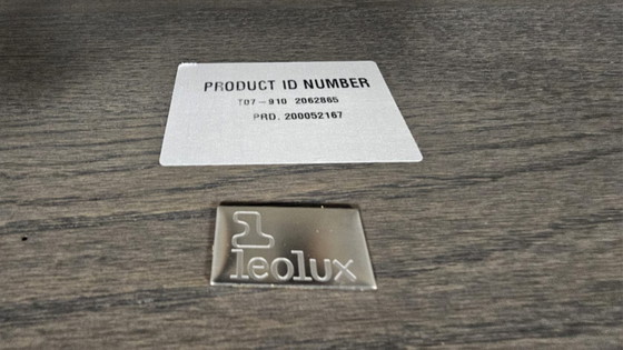 Image 1 of Leolux rolan salontafel 130x70. Blad: eiken; poten: epoxy; tafel hoogte 37cm