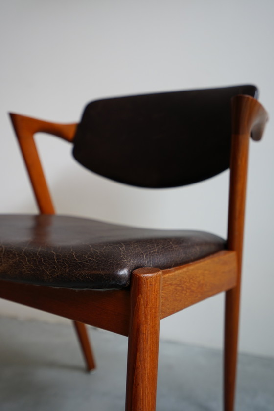 Image 1 of 6 Kai Kristiansen stoelen | Model 42 | Teak Leder patina