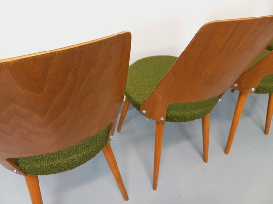 Image 1 of Set van 4 vintage Mondor stoelen van Baumann in hout en bouclé stof uit de jaren 60