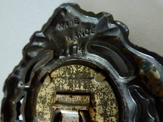 Image 1 of Kleiner antiker Bilderrahmen mit einem Bild der Heiligen Theresa.