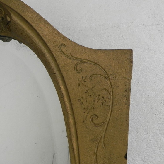 Image 1 of Gold oval mirror with cut edge, 1950s