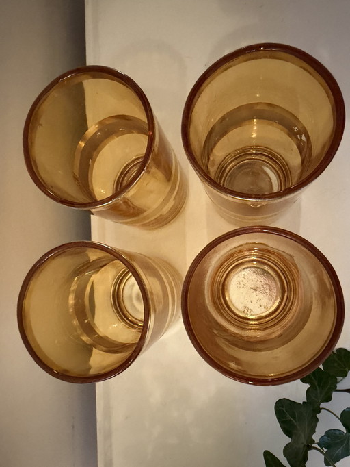 Set van 4 amberkleurige glazen met goudkleurige band