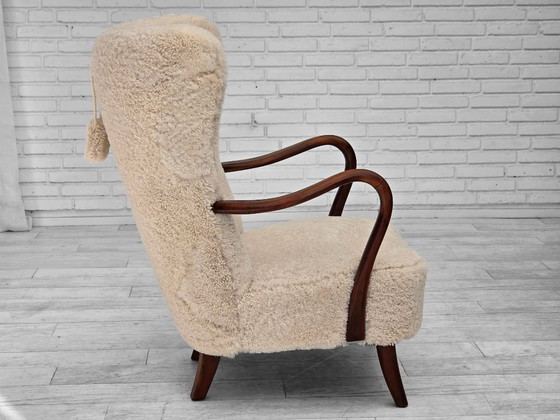 Image 1 of Jaren 60, Deens ontwerp van A. Christensen voor Slagelse Møbelværk, schapenvacht.