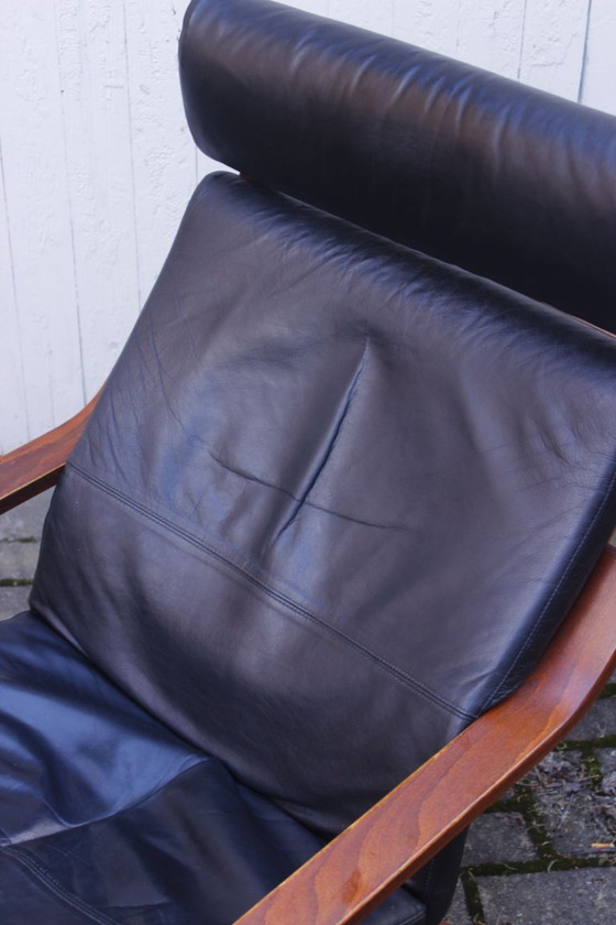 Image 1 of Ikea Vintage - Ikea POÄNG recliner and footstool in black leather, Scandinavian design, 1990s