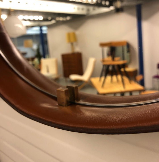 Image 1 of https://www.1stdibs.com/furniture/mirrors/wall-mirrors/pizzetti-cognac-leather-mirror-1950s-italy/id-f_33697732/