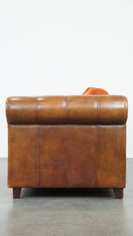 Image 1 of Divano in pelle di pecora da 2,5 posti di alta qualità con cuscini di seduta e schienale in tessuto arancione