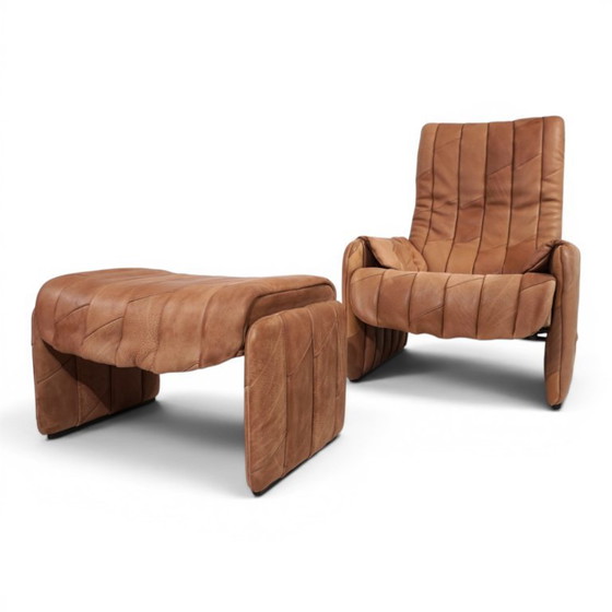 Image 1 of De Sede Ds 50 fauteuil met voetenbank, bekleed met buffelleer en patchwork, 1970