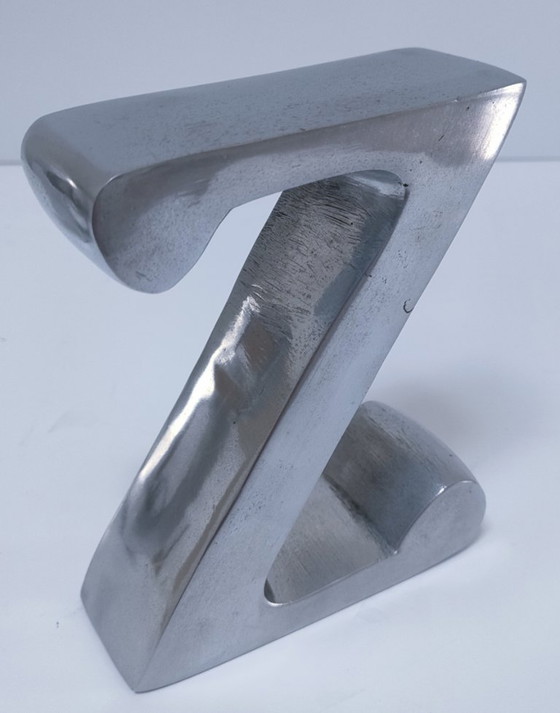 Image 1 of coppia di fermalibri in alluminio pressofuso a forma di "a" e "z"