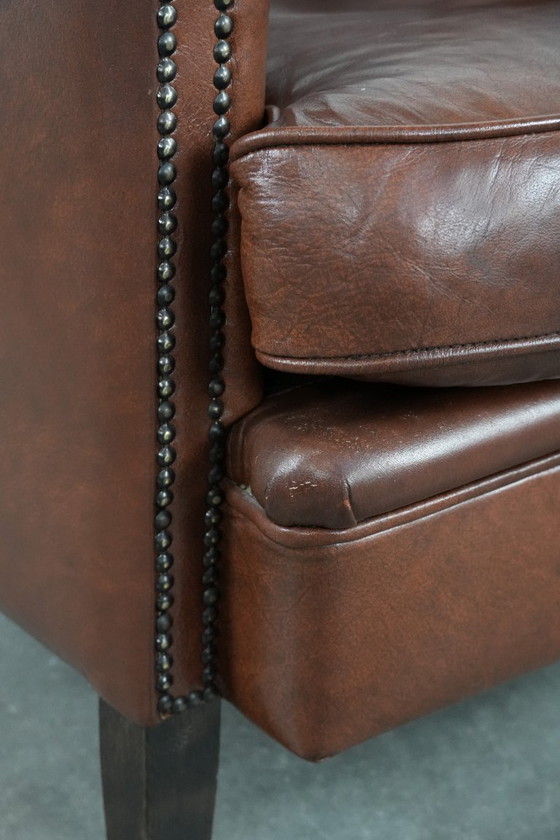 Image 1 of Cognac-colored cowhide leather club armchair in English style with a luxurious appearance