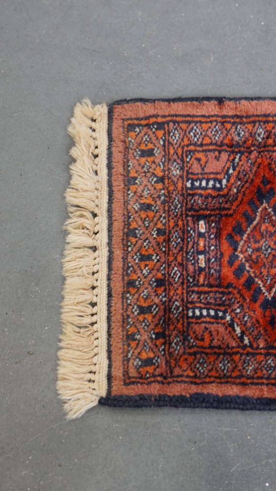 Image 1 of Petit tapis ornemental 38x30cm