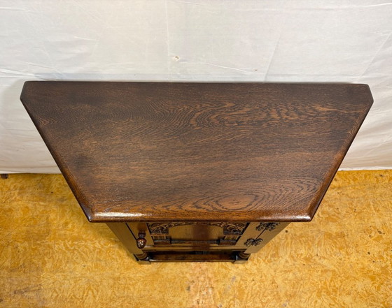 Image 1 of Vintage Old Charm Furniture Canted Side Cabinet by Wood Brothers (Circa 1970)  A charming and beautifully crafted vintage canted
