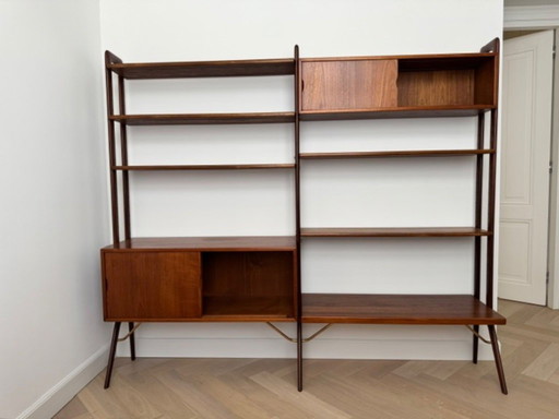 Modular and adjustable Danish modern teak bookshelf with brass details by Kurt Østervig for KP Møbler Denmark 1960s