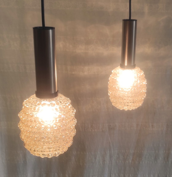 Image 1 of Hanglampen van amberkleurig glas in de stijl van H. Tynelle - jaren 70
