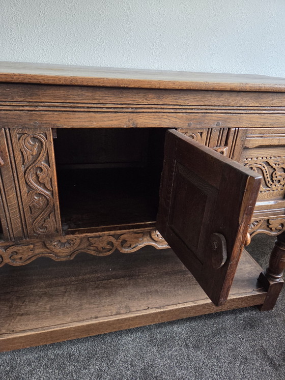 Image 1 of Antique sideboard with beautiful wood carving