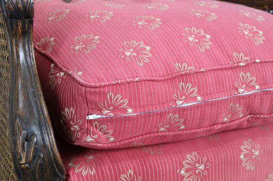 Image 1 of Ancienne chaise à oreilles sculptée avec côtés en canne, Tchécoslovaquie