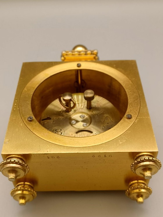 Image 1 of Pendule horloge d'officier de style Louis XVI en bronze ciselé et doré, cadran signé Hour Lavigne. 