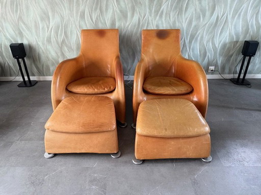 2 Loge Armchairs + Hocker. Offered