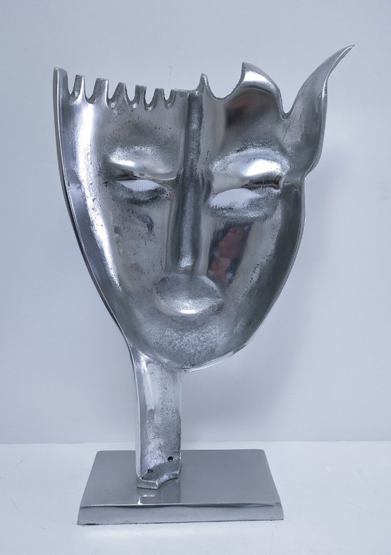 Image 1 of sculpture visage stylisé métal poli