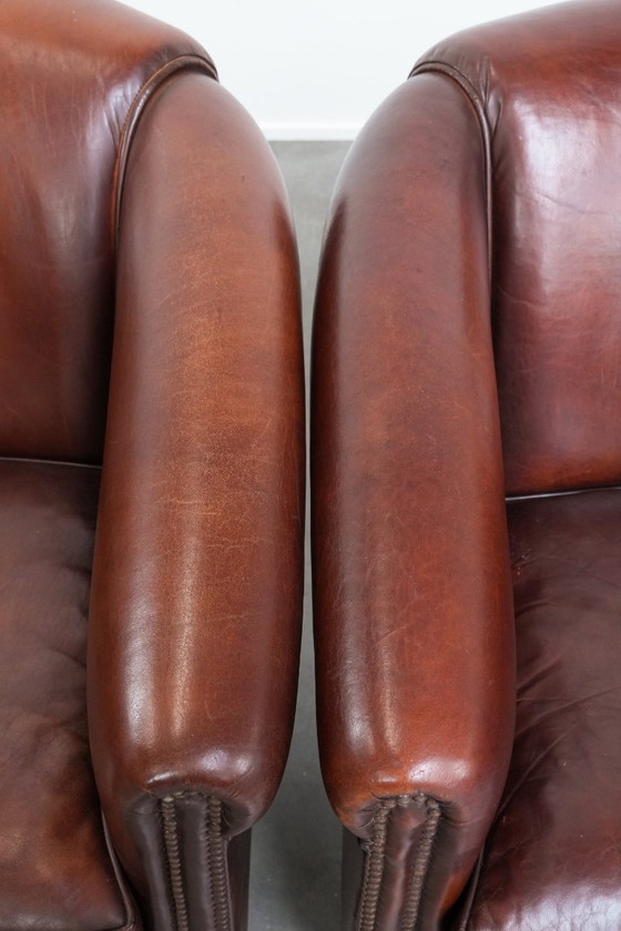 Image 1 of 2 x Vintage schapenleren clubfauteuil met siernagels 