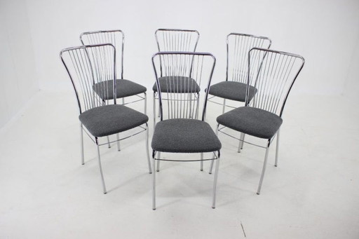 Set van zes Italiaanse eetkamerstoelen van chroom en bouclé, jaren 70.