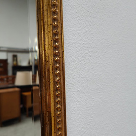 Image 1 of Miroir sur pied DeKnudt vintage doré de style Hollywood Regency
