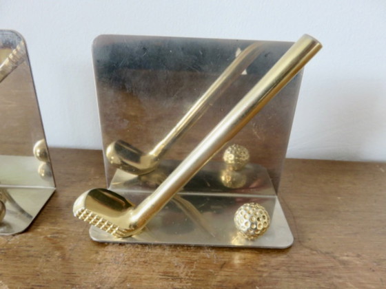 Image 1 of Sujetalibros "Tenis y Golf", 1970