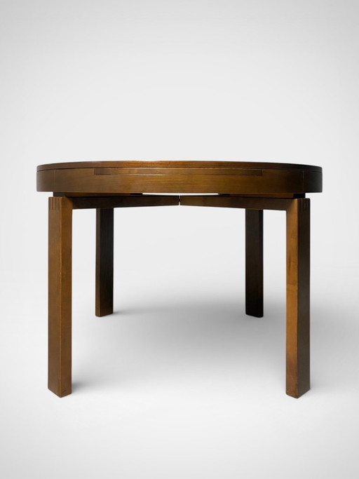 Vintage extendable brutalist round table from the 60s/70s