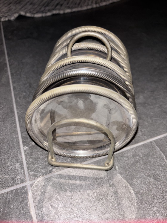Image 1 of Vintage flessenonderzetters met houder – set van 6 – zilverkleurig