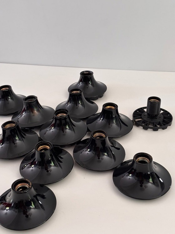 Image 1 of Komposition aus 13 Teti Vico Magistretti Wandleuchten für Artemide, 1970, schwarz lackiertes ABS, Space-Age-Finish