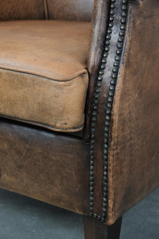 Image 1 of Timeless vintage sheepskin club armchair with character and a beautiful patina