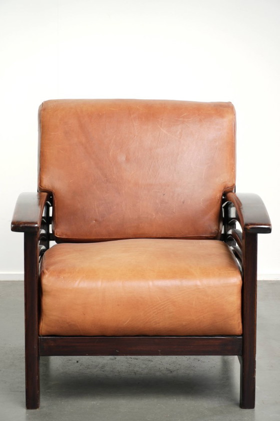 Comfortable and beautiful cognac-colored cowhide leather armchair in luxurious Art Deco design – Klassiek (photo 2 of 12)