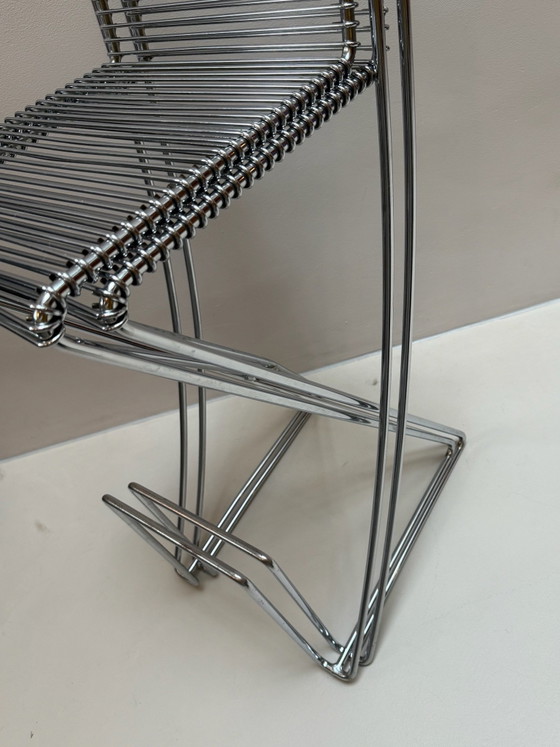 2 x Till Behrens “Cross Swinger” Taburetes de bar – rvs (photo 7 of 8)