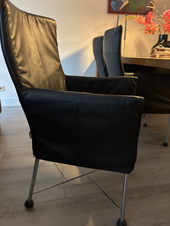 Image 1 of 6 zwarte Montis Chaplin stoelen met rvs onderstel