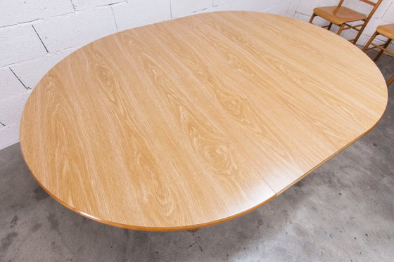 Image 1 of Danish modernist set: convertible round table (114/154cm) + 4 matching chairs, 1980