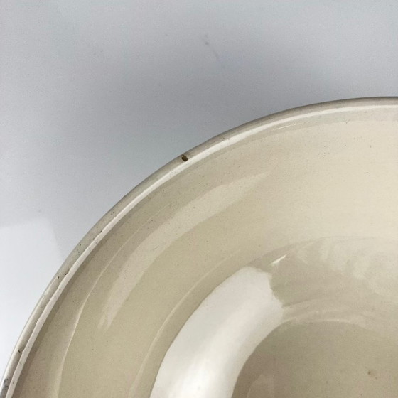 Image 1 of Saladekom van halfporselein uit Badonviller, met blauw bloemenpatroon, begin 20e eeuw.