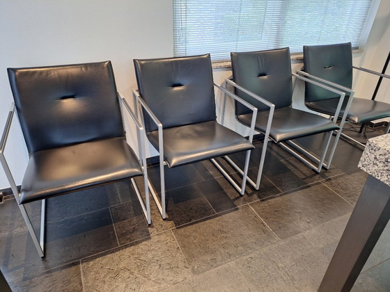 Image 1 of Zwart lederen Arco Frame eetkamerstoelen