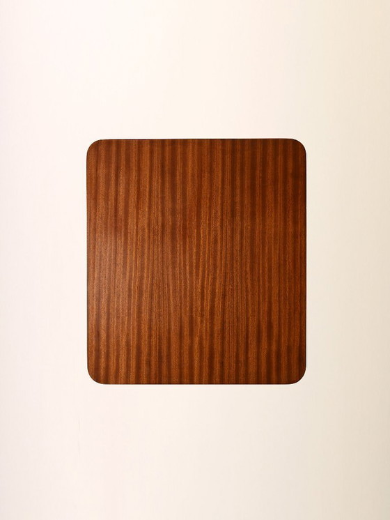 Image 1 of Table basse scandinave vintage en teck à roulettes