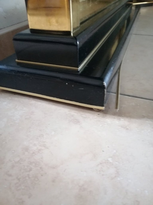 black lacquer dining table with brass inlays Hollywood Regency