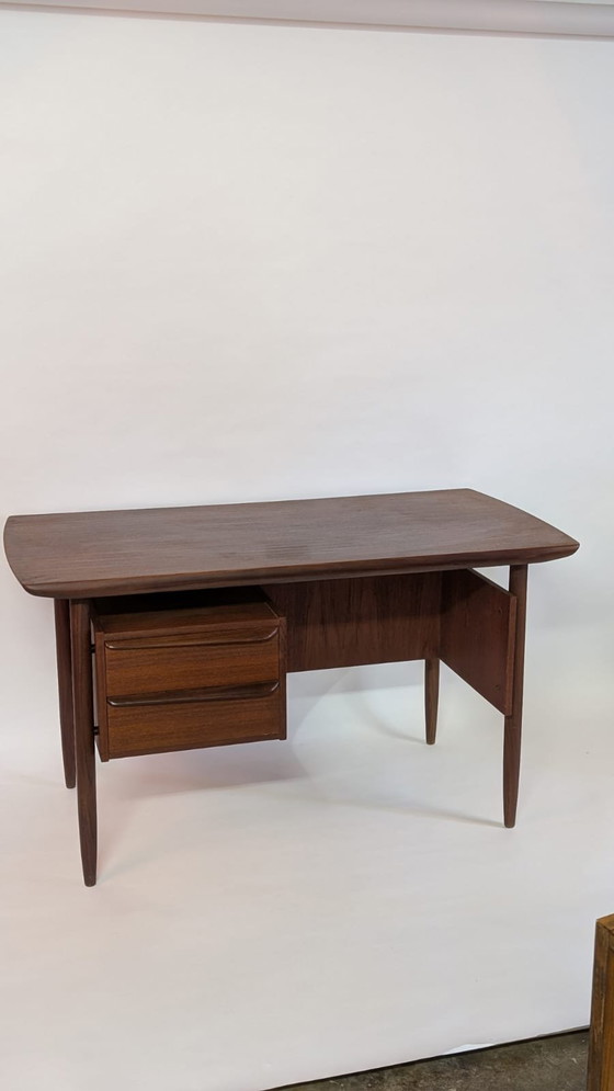 Image 1 of Iconic Mid-Century Teak Desk by Tijseling for Hulmefa made in the 1950s.
