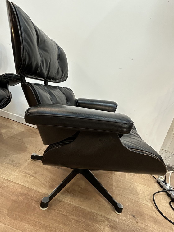 Image 1 of Een paar Eames loungestoelen