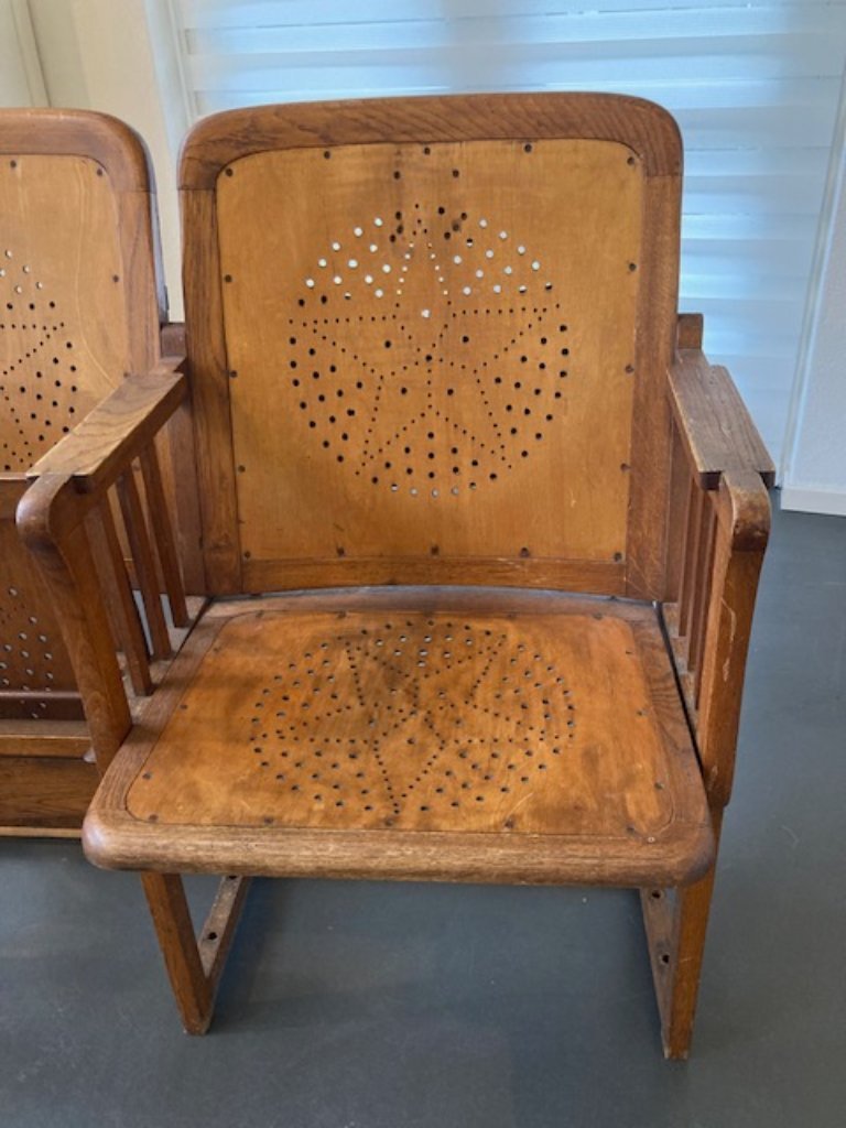 3 auction chairs with folding table on the back