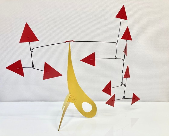 Image 1 of Yellow Stabile, 11 red triangles