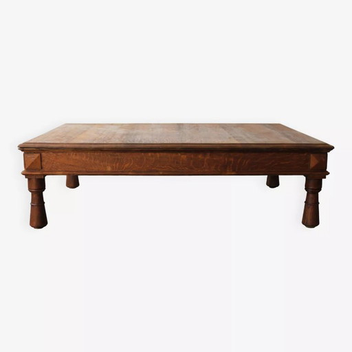 Large, solid oak coffee table, sturdy and convivial.