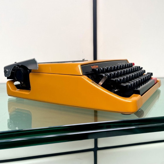 Image 1 of Macchina da scrivere Brother Deluxe 250TR gialla degli anni '70 con custodia, prodotta in Giappone.