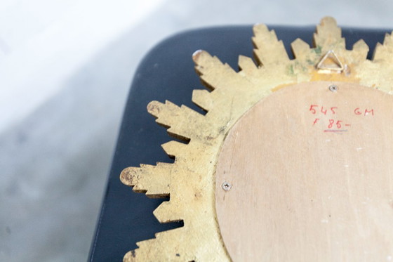 Image 1 of Vintage bolle spiegel uit de jaren 70 met heksenoogmotief en zonnestralenmotief.