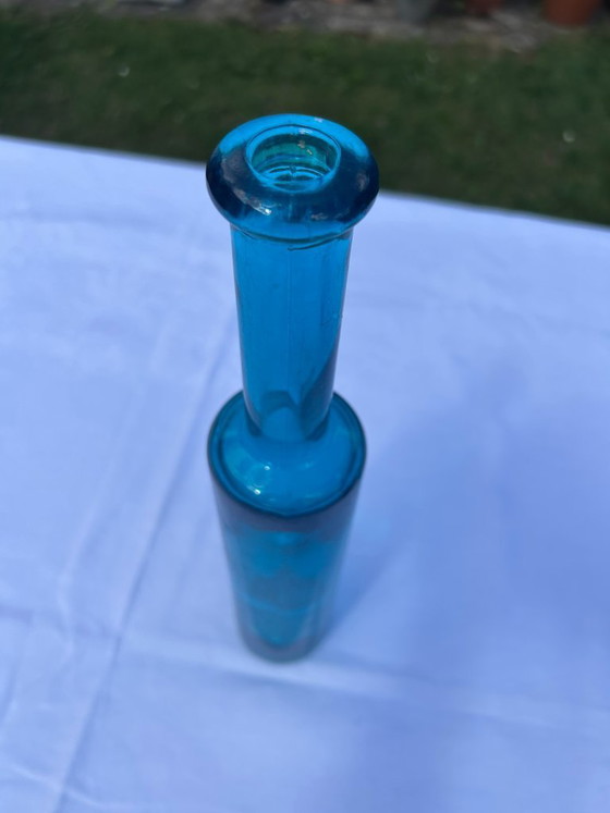 Image 1 of 2 bottles: Apothecary bottle + Elegant turquoise glass bottle, vintage turquoise