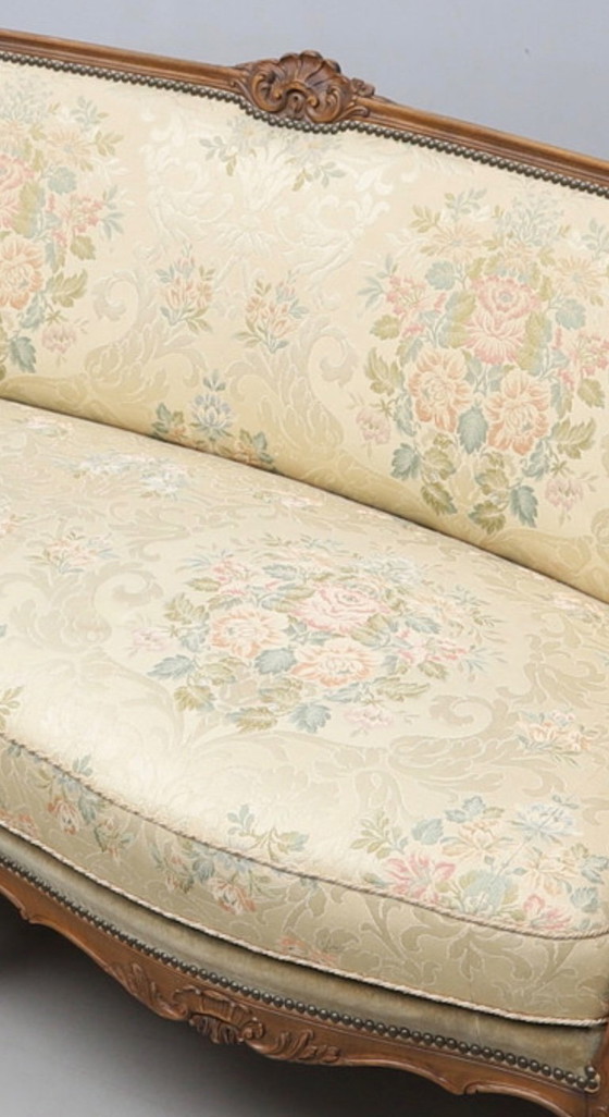 Image 1 of Antique-inspired Rococo style 3-seater sofa with a gilt wooden frame and floral brocade upholstery, in good condition with minor