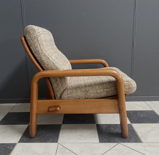 Image 1 of Fauteuil des années 1970 de la marque Dyrlund Denmark, avec un bon revêtement d'origine.