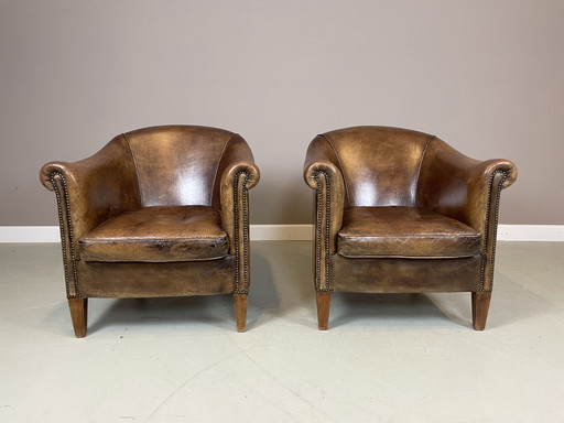 2x Sheepskin leather club chairs Nico v Oorschot vintage