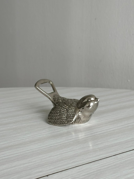 Alter Flaschenöffner aus Metall in Vogelform